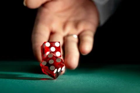 Man gambling at the craps table Stock Photos