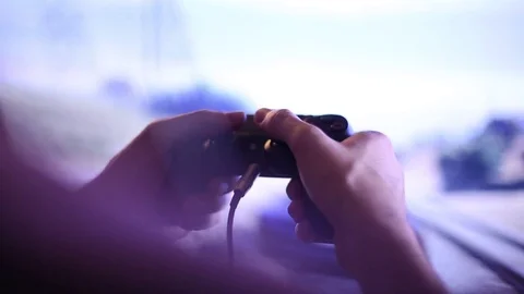 Man Gaming with Controller Stock Footage 69744734