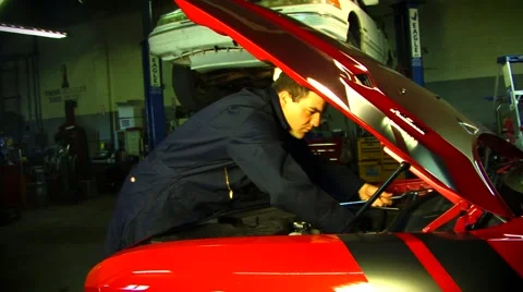 Man in garage working on hotrod 스톡 동영상 44067775