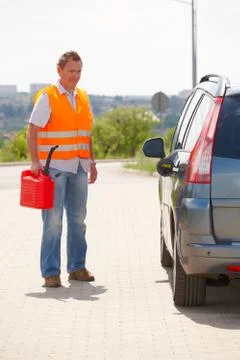 Man with gas can Stock Photos
