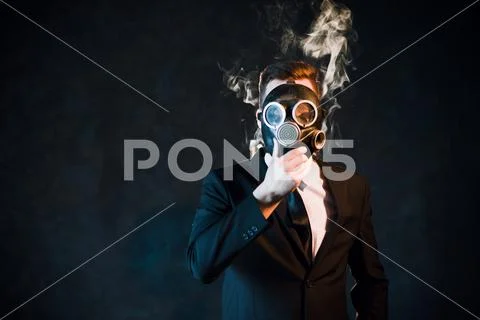 Man gas mask nicotine cloud passive smoker danger Stock Photos