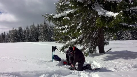 Man Gearing Up For Winter Hike Stock Footage 228853165