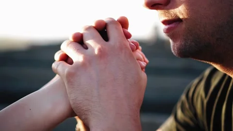 The man gently holds the hands of his beloved in his hands Stock Footage 305835207