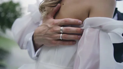 The man gently hugs his girlfriend, hugging her to him Stock Footage 219474004