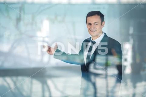 The man gesture over the window Stock Photos