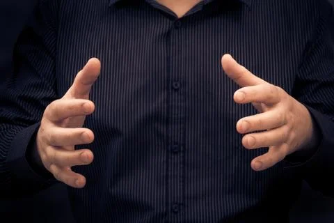 Man gesture showing size something Stock Photos