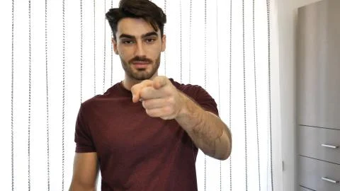 Man gesturing with his hand, pointing finger at you Stock Photos