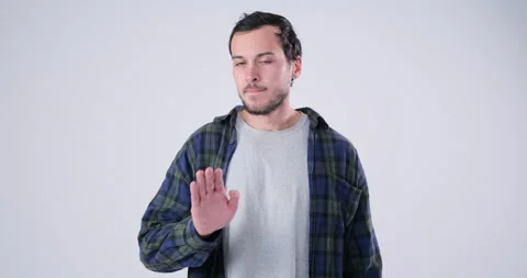 Man gesturing no with crossing arms 库存影片 143942270