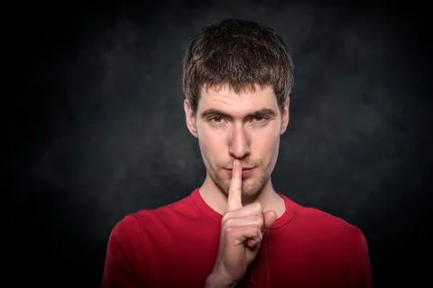 Man gesturing silence. Stock Photos
