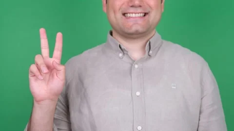 Man Gesturing Victory Sign Stock Footage 278185464
