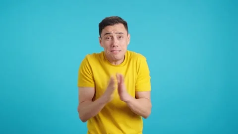 Man gesturising a small amount with his fingers Stock Footage 244705011