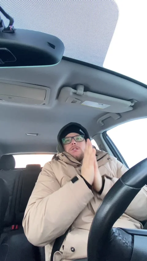 Man get cold in car Stock Footage 243591010