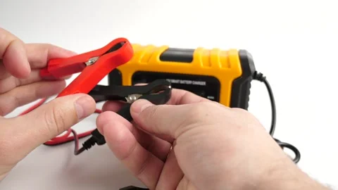 A man gets acquainted with the functions and capabilities of a multi-function Stockbeeldmateriaal 265960380
