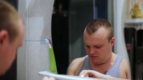 Man Gets After Shave Balm Stock Footage 63602273