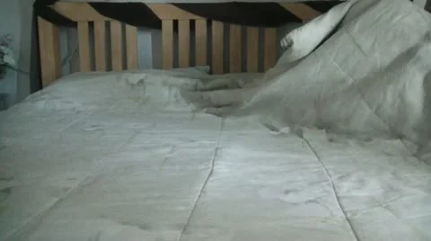 Man Gets into Bed to Sleep 스톡 동영상 12597124