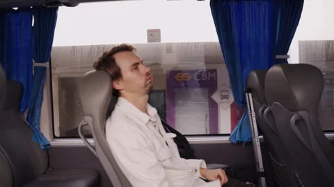 A man gets on a bus to trave Stock Footage 293283074