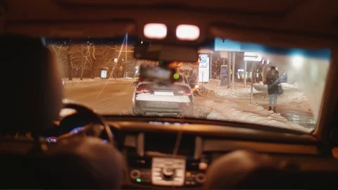 Man gets into car to unpark it and continue driving Stock Footage 106400007