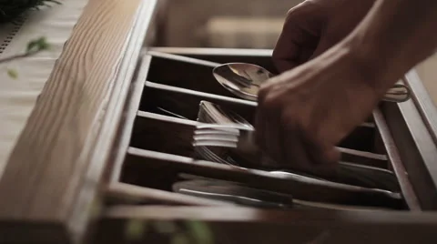 Man gets cutlery Stock Footage 47557818