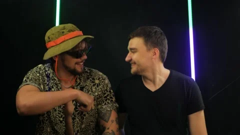Man gets excited after best friend shows him prohibited drugs at party 스톡 동영상 199092780