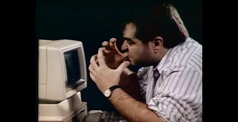 Man Gets Frustrated with Computer (1990) Stock Footage 273665598