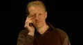 Man gets funny gossip during phone call HD Footage