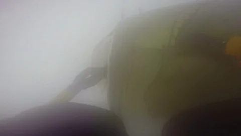 Man gets inside his tent during a blizzard Stock Footage 79978402
