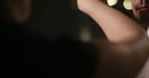 Man get's make up and powder before performance by make up artist. Stock Footage 68790664