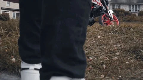 Man Gets On Motorcycle But It Doesn't Start Stock Footage 124672865