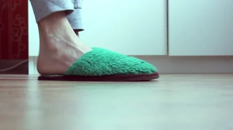 Man gets out of bed, puts on sneakers and walks away Stock Footage 50944331