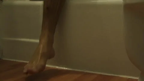 Man Gets Out of the Tub Stock Footage 154181310