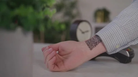 Man Gets QR Code on the Inside of His Wrist Scanned for a Transaction Stock Footage 208797817
