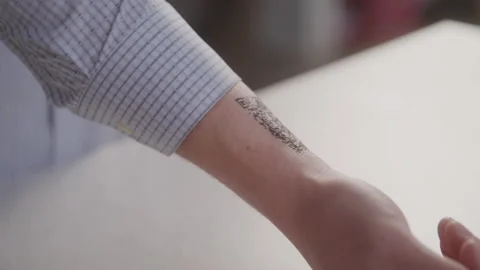 Man Gets QR Code on the Inside of His Wrist Scanned by a Smartphone Stock Footage 208797842