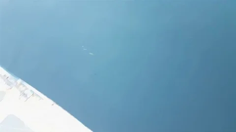 Man gets scomber in sea from board of yacht Stock Footage 72977700