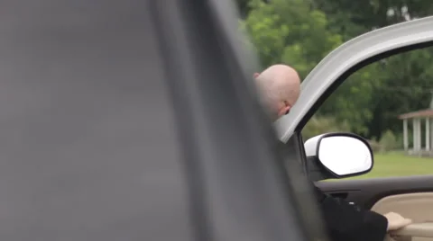 Man gets into an SUV Stock-Footage 44234280