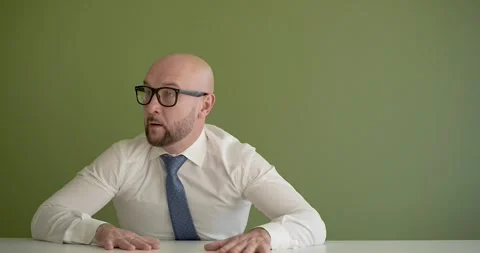 A man gets up from under the table emotionally difficult Stock Footage 267087453
