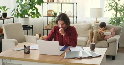 Man getting annoyed while working on desk Video stock 145222349