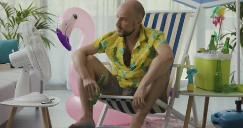 Man getting bored on his staycation Stock Footage 162383395