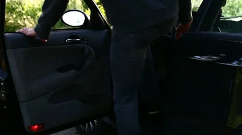 A man getting in the car Stock Footage 11114944