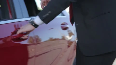 Man getting into a car Stock Footage 53521786