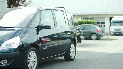Man getting into car Stock Footage 63289661