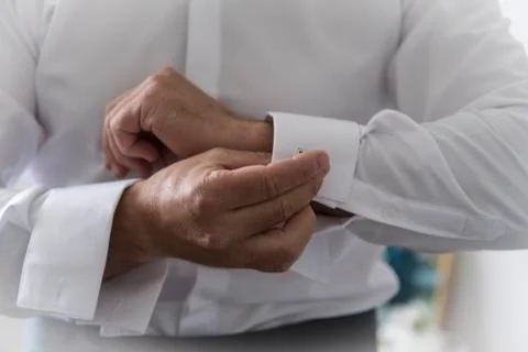 Man getting dressed Stock Photos