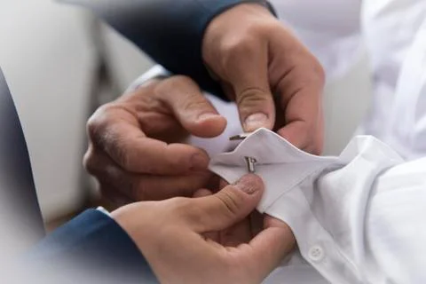 Man getting dressed Stock Photos