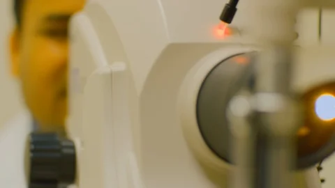 Man getting eye checkup Stock Footage 105820316
