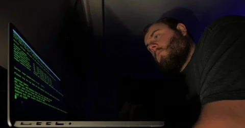 Man getting frustrated with a computer server not responding Stock Footage 81948143