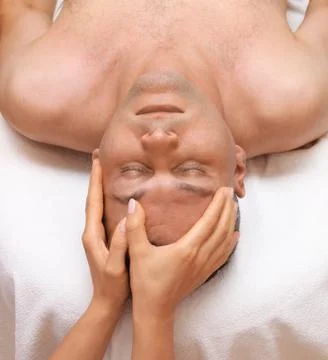 Man getting a Head massage Stock Photos