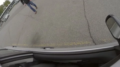 Man getting into his car Stock Footage 40906442