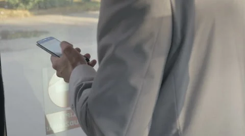 Man getting out of a bus with phone Stock Footage 67105886