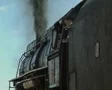 Man getting out of Turkish steam train and walking away SD Footage