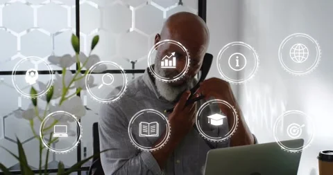 Man getting phone call, using laptop and noting for education as animated graph Stock Footage 331045319