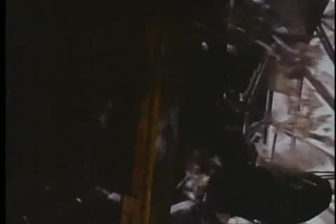 Man getting pushed through rooftop window and falling down elevator shaft Video stock 11346289